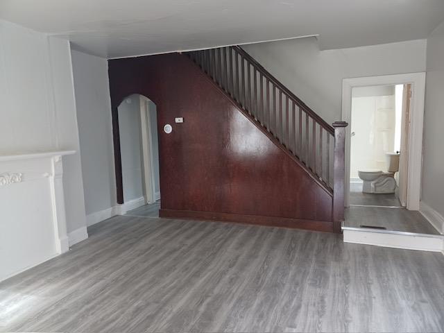 Living Room with Original Staircase